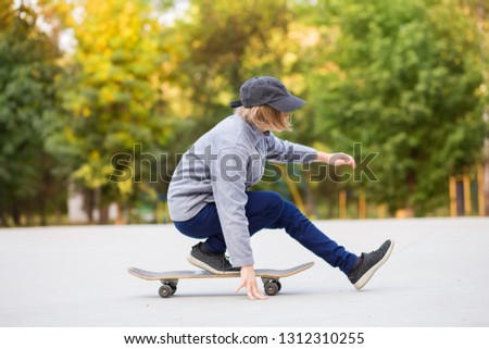 Similar – Image, Stock Photo teenager practicing with skateboard at sunrise city