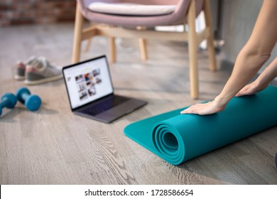 Young Sporty Slim Woman Preparing For Online Fitness Training With Modern Laptop. Healthy Lifestyle Concept, Online Fitness And Sport Lessons. 