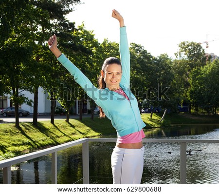 young sporty woman jump outdoor