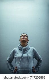 Young Sporty Woman Looking Up