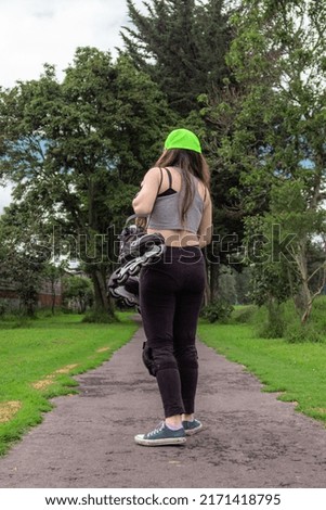 Similar – Image, Stock Photo Brunette girl holding surfboard over head and walking