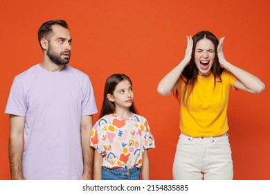 Young Stressed Parents Mom Dad With Child Kid Daughter Teen Girl In Basic T-shirts Scream Swearing Shout Loud Isolated On Yellow Background Studio Portrait. Family Day Parenthood Childhood Concept.