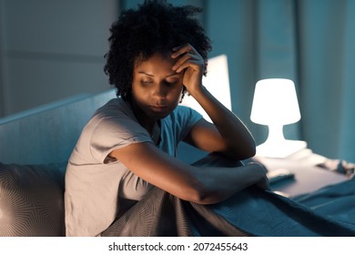 Young Stressed Woman Suffering From Insomnia, She Can't Sleep And She Has A Headache