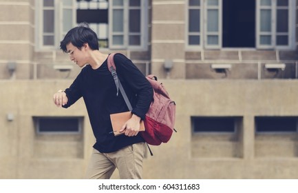 Young student college hurry late for class - Powered by Shutterstock
