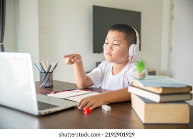 Young Student Distance Learning Virtual Distance Online Class On Video Call Virtual Lesson, Technology Studying At Home Using Laptop Computer. Parent Or Tutor Teaching Child Boy With Remote Education.