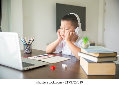 Young Student Distance Learning Virtual Distance Online Class On Video Call Virtual Lesson, Technology Studying At Home Using Laptop Computer. Parent Or Tutor Teaching Child Boy With Remote Education.