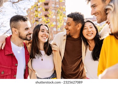 Young student friends group smile standing together outdoors. Diverse college people having fun enjoying funny moments in city street. Youth community and friendship concept. - Powered by Shutterstock