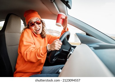 A Young Student Girl Was Distracted By A Coffee Drink And Talking With Her Friend By Phone. Accident Risk And Auto Insurance