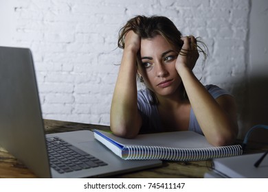 Young Student Girl Studying Late Night  Tired At Home Laptop Computer Preparing Exam Exhausted And Frustrated Feeling Stress And Bored Lying Lazy On Desk In Lifestyle And Education Concept