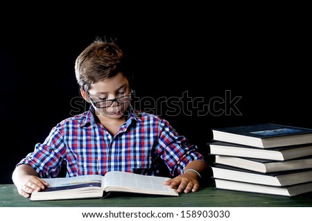 boy reading books