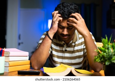 Young Student Reading On Midnight Exam Preparation Reading Not Understanding Books At Home - Concept Of Reading Problem Or Difficulties, Trouble Seeing At Night Studying