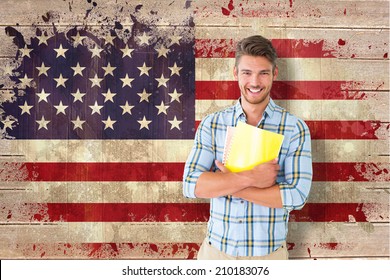 Young Student Smiling Against Usa Flag In Grunge Effect