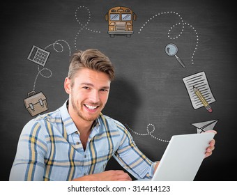 Young Student Using Laptop Against Black Background