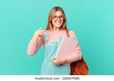 young student woman feeling happy and pointing to self with an excited - Shutterstock ID 2200479585