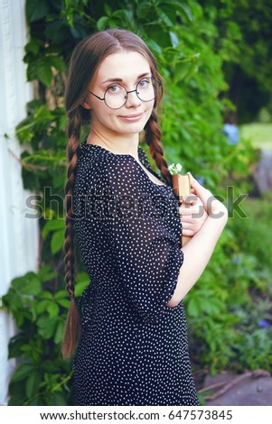 Similar – Woman, pretty, young, glasses, hat, upper body