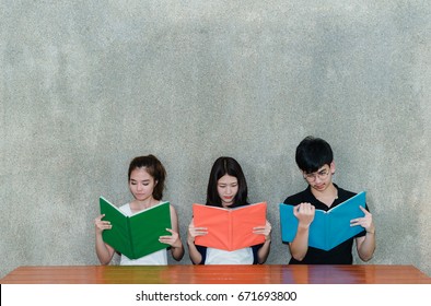 Young Students Asian Together Group Teenager Smile With School Folders Reading Book At High School University Campus College Knowledge Center For Study Learning In Summer Outdoor,copy Space The Top.