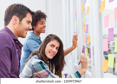 Young students as a business start-up team have fun in the creative ideas workshop - Shutterstock ID 1359973967