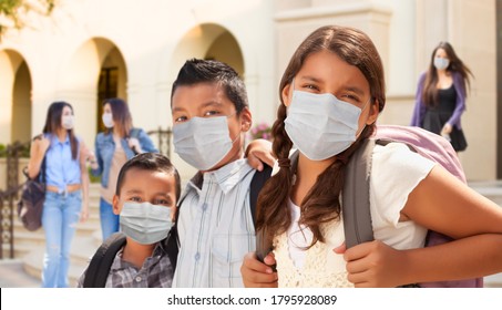 Young Students on School Campus Wearing Medical Face Masks. - Powered by Shutterstock