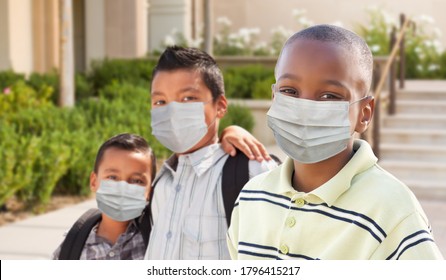 Young Students On School Campus Wearing Medical Face Mask During Coronavirus Pandemic.