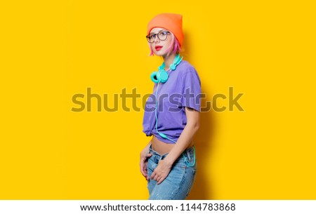 Similar – Attractive girl with a hat over a yellow wall