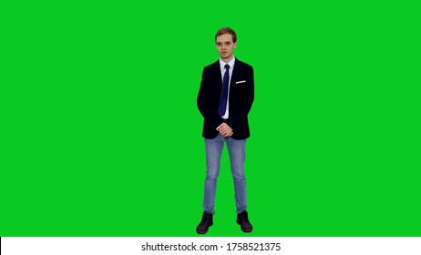 Young stylish businessman in suit jacket standing before presenting something on green screen background - Powered by Shutterstock