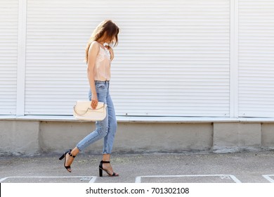 Young Stylish Woman Wearing Beige Cami Stock Photo 701302117 | Shutterstock