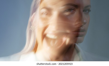 Young Stylish Woman In A White Jacket, Distortions Of The Model's Face On A Long Exposure. Second Personality, Alter Ego Concept