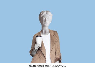 Young successful business woman headed by antique statue holds a white paper cup pf tea or coffee isolated on color blue background. 3d trendy collage in magazine style.Contemporary art. Modern design