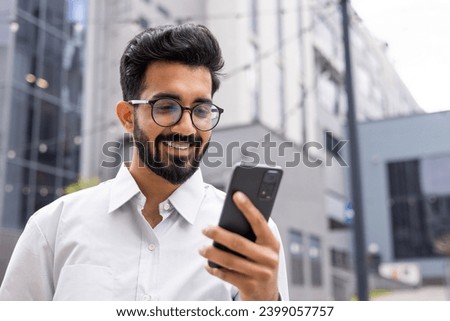 Similar – Image, Stock Photo young man holding his fiance’s hand with gold ring while making a marriage proposal with bouquet of red roses. Engagement of a young couple in love. The concept of love and togetherness.