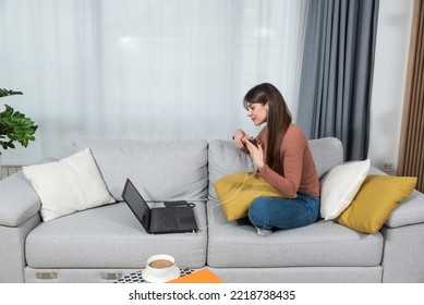 Young Successful Experienced Freelancer Woman Giving Free Business And Financial Advices On Video Call On Laptop. Female Marketing Expert Helping People With New Small Business On Conference Call.