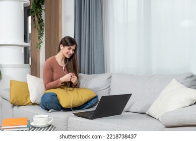 Young Successful Experienced Freelancer Woman Giving Free Business And Financial Advices On Video Call On Laptop. Female Marketing Expert Helping People With New Small Business On Conference Call.