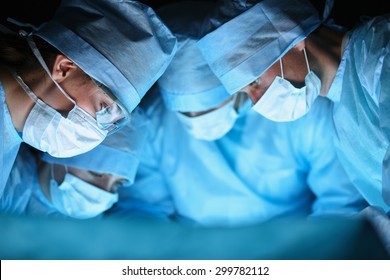 Young surgery team in the operating room - Shutterstock ID 299782112