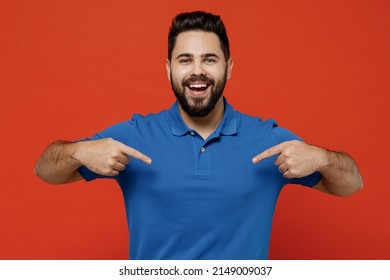 Young surpirsed fun smiling happy caucasian man 20s wear basic blue t-shirt looking camera point index finger on himself isolated on plain orange background studio portrait. People lifestyle concept - Shutterstock ID 2149009037