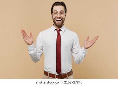 Young Surprised Amazed Fun Successful Employee Business Man Corporate Lawyer 20s Wear Classic Formal White Shirt Red Tie Work In Office Spread Hands Isolated On Plain Beige Background Studio Portrait