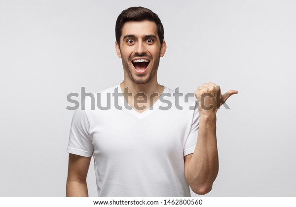 Young Surprised Man White Tshirt Pointing Stock Photo 1462800560 ...