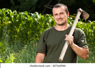 Young Sweating Farmer After A Day Of Work