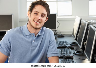 Young Teacher In Empty Classroom