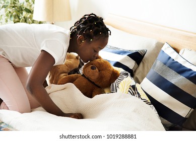 Young Teen Girl Kissing A Teddy Bear