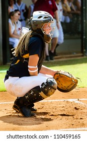 Young Teen Girl Playing Softball In Organized Game