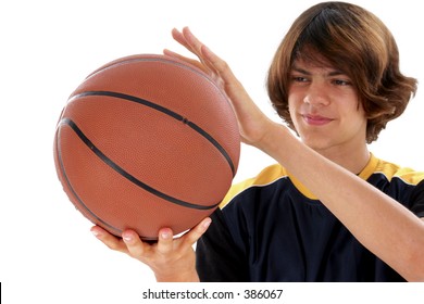 Young Teen Native American Boy Child With Basketball Smiling.