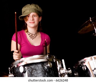 Young Teen Playing The Drums.