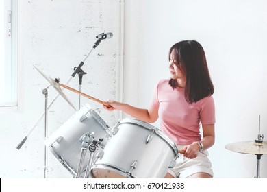 Young Teen Playing The Drums