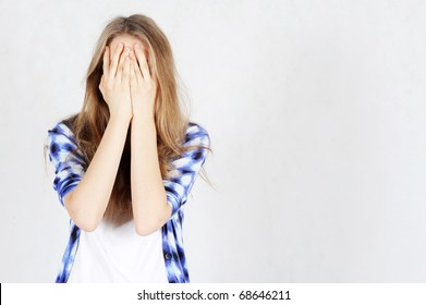 Young Teen Woman Covering Her Eyes