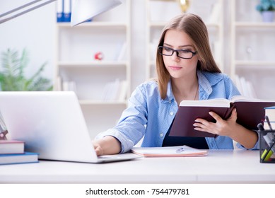 Young teenage female student preparing for exams at home - Shutterstock ID 754479781