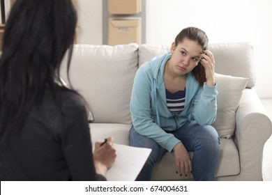  Young Teenage Girl With Psychologist On Therapy