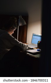 Young Teenage Girl Student Studying Late At Night In Her Room