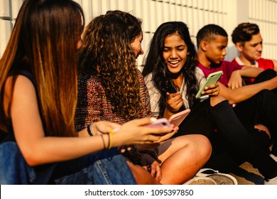Young teenager friends chilling out together