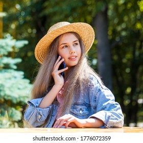 Young teenager girl with a mobile phone - Shutterstock ID 1776072359