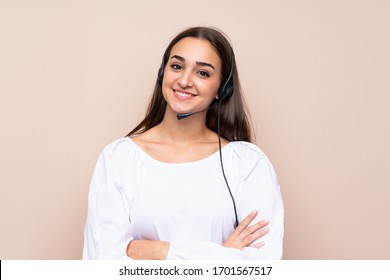 Young Telemarketer Woman Over Isolated Background Smiling A Lot