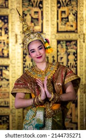 A young Thai girl dressed in a beautiful pantomime dressed in the character of Nang Srida dancing in a Thai pantomime performance; Khon is traditional dance drama art of Thai classical masked